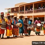 Home 21 말리 전통 춤과 공연 - A vibrant scene of traditional Bambara dancers performing outdoors during a community festival in Ma...